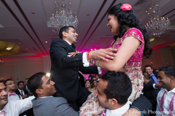 bride,and,groom,dancing,Damion,Edwards,Photography,dancing,at,the,indian,wedding,reception,indian,wedding,reception,traditional,dancing,customs