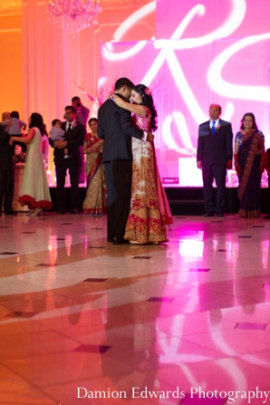 bride,and,groom,dance,at,reception,Damion,Edwards,Photography,dance,floor,lighting,at,reception,indian,wedding,reception,lighting,lighting,at,wedding,reception,wedding,lighting,ideas