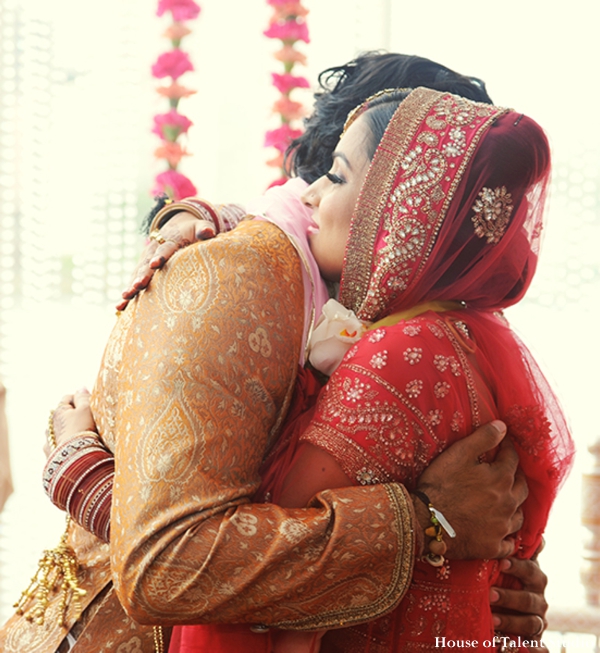 Ceremony,indian-wedding-bride-groom-embrace-red