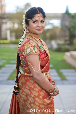 A portrait of the bride in her traditional lengha.