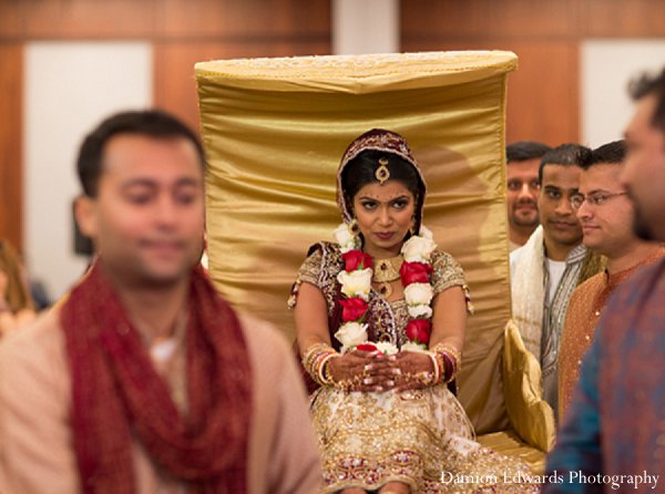 indian wedding bride ceremony gold doli