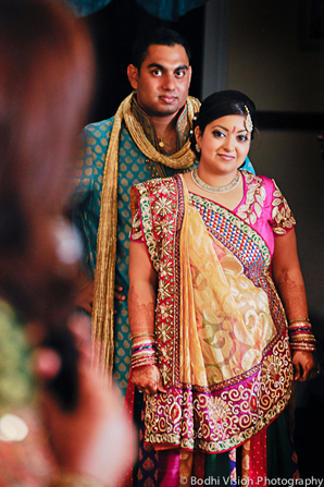 indian wedding bride groom blue pink