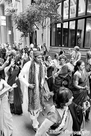 An Indian wedding takes place in the city of San Francisco. The bride and groom wed in a traditional Hindu ceremony and have a reception in an elegant ballroom.