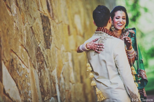 Indian couples\' wedding portrait. The bride and groom pose for an outdoor portrait photography session.