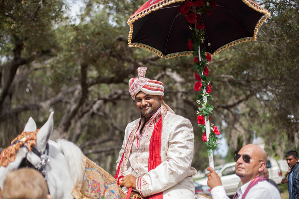 The groom travels with the traditional baraat to the Indian wedding ceremony.