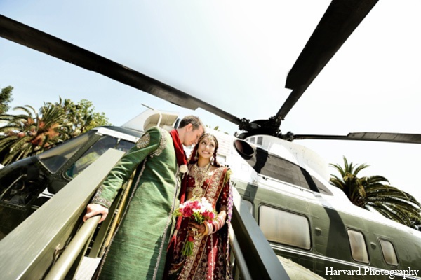 Bride and groom sneak a photo of a helicopter at the Nixon Library.