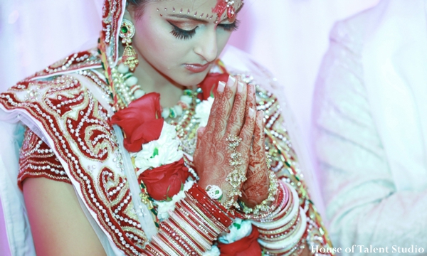 The bride and groom at the Indian wedding ceremony where traditional rituals and customs are performed.