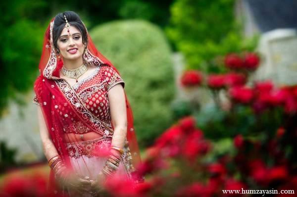 indian wedding outdoor portraits bride red lengha