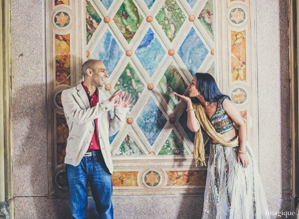 indian wedding engagement session bride groom glass window
