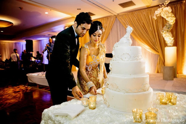 indian wedding reception cake cutting bride groom