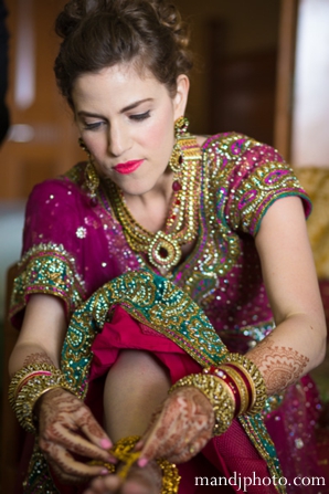 indian wedding bride getting ready traditional dress