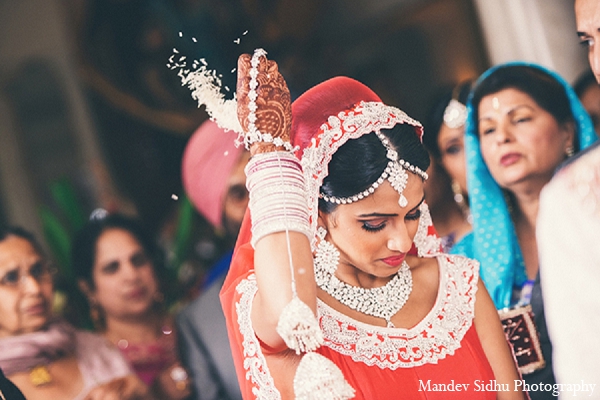 An Punjabi bride and groom wed in a traditional Sikh ceremony. Their wedding festivities also include a maiya and doli.