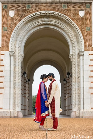 indian wedding arch outside portraits bride and groom