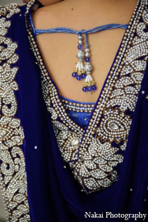 The bride wore a midnight blue choli for the winter themed reception.