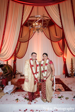 The bride and groom participate in Gujarati Hindu customs and rituals  throughout the Indian wedding celebration.