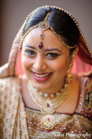 The bride wore traditional Indian wedding jewelry for the ceremony.