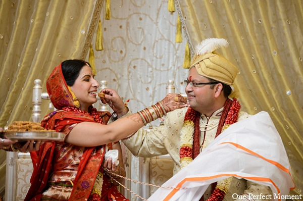 This traditional bride and groom celebrate their union with a Hindu wedding ceremony.