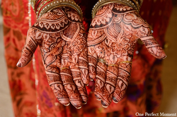 This traditional bride and groom celebrate their union with a Hindu wedding ceremony.