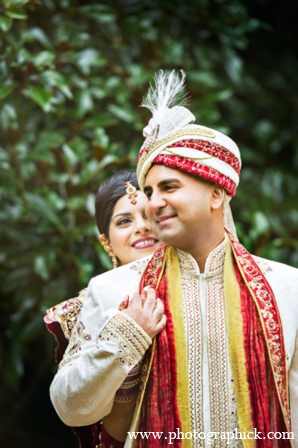 The Indian bride and groom enjoy their traditional Hindu wedding celebration.