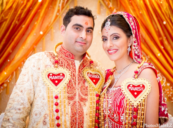 indian wedding bride groom orange red gold