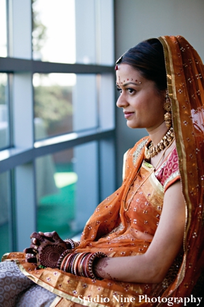 indian-wedding-bride-sitting-by-window