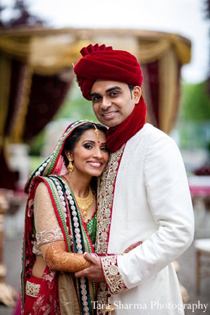 This Indian bride and groom celebrate their wedding with lots of style. Their New Jersey event stuns with beautiful floral and decor.