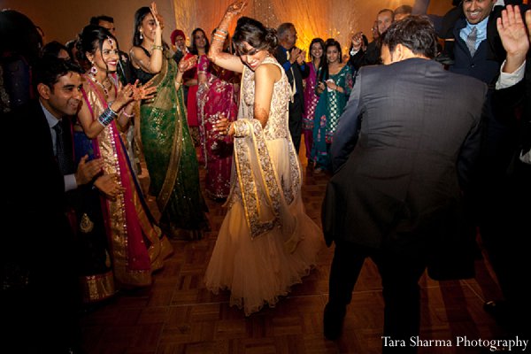indian wedding reception dancing bride