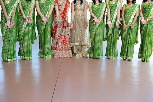 Indian bride and bridesmaids in green sari