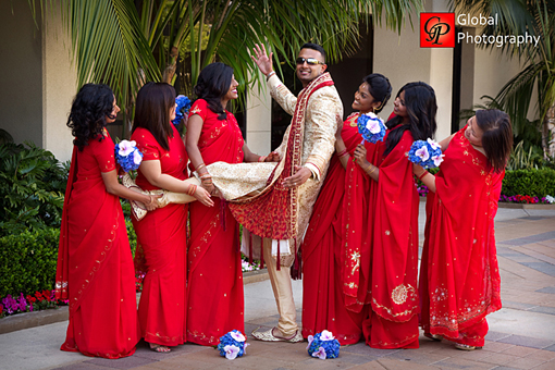 Indian wedding, red bridesmaid saris