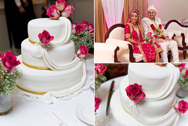 An Indian wedding cake is decorated in a simple, modern style with pink roses.