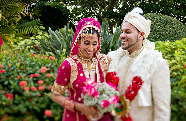 Indian bride and groom take wedding portraits at their Muslim Indian wedding.