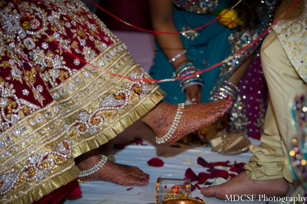 Bridal mehndi on feet with Indian bridal anklets.