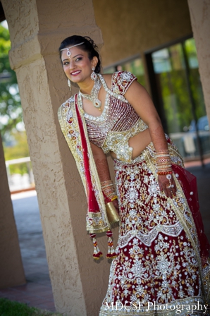 Indian wedding photography captures traditional indian bride.