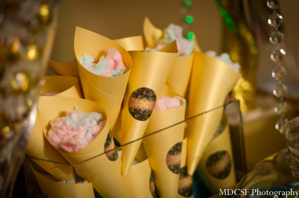 Indian wedding treats in custom cotton candy cones.