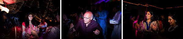 Indian wedding guests party at a nighttime outdoor sangeet.