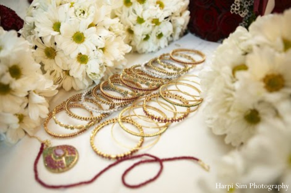 Indian bridal jewerly set includes these gold arm bangles.