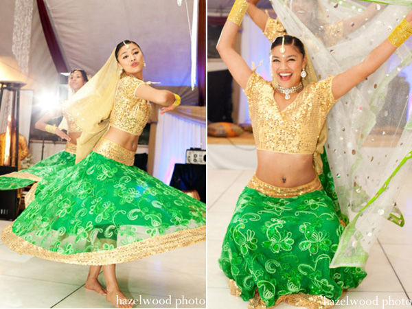 A dancer performs in a lengha at a bridal mehndi party.