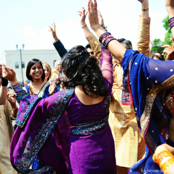 Indian wedding photography captures dancing at baraat.