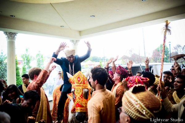 Indian wedding begins with Indian groom at his baraat.