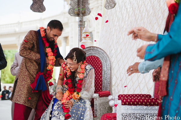 Roses petals thrown at indian bride during indian wedding ceremony.
