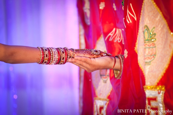 Indian bride wears traditional indian wedding bangles.