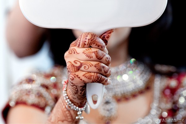 indian bride wears bridal henna.