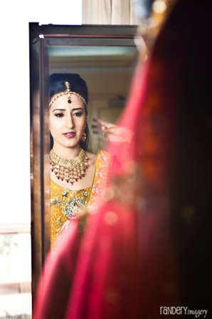Indian bridal hair and makeup before indian wedding.