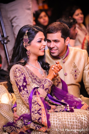 Indian bride and groom in matching wedding outfits for engagement