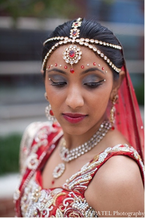 Indian bride in traditional Indian bridal jewelry set.