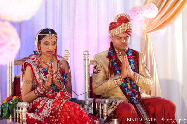 An indian bride and groom at their modern hindu indian wedding.