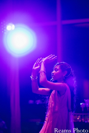 dance performances at indian wedding reception.