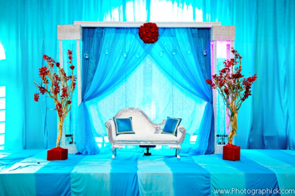 Decor ideas for Indian wedding reception in blue, turquoise and red.