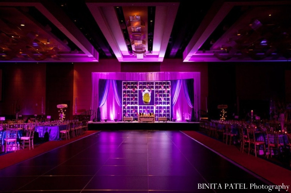 Indian wedding reception ballroom in purple.
