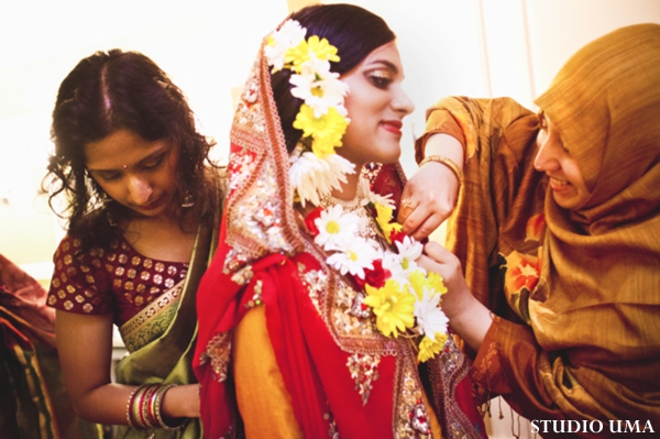 Indian bride readies for pre indian wedding ceremony called a haldi.